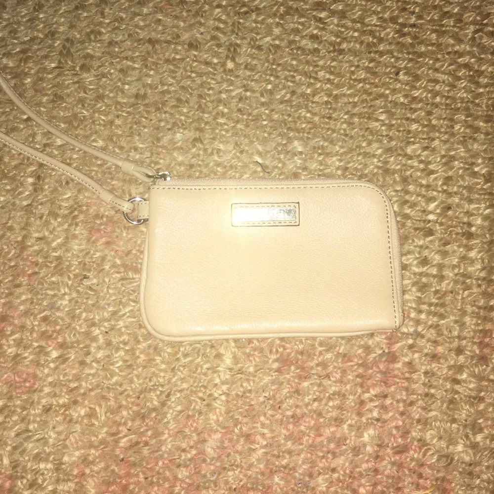 Small tan Calvin Klein Wristlet